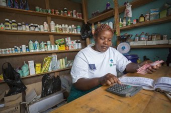 A business Woman in Tanzania in her shop